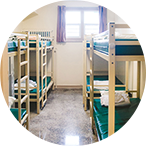View of a room with bunk beds.